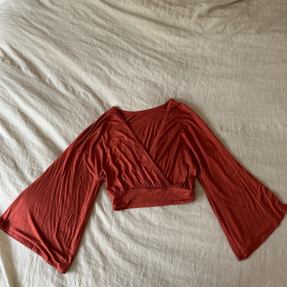 Lulu’s Turn of Events Rust Orange Reversible Long Sleeve crop top - Picture 3 of 5